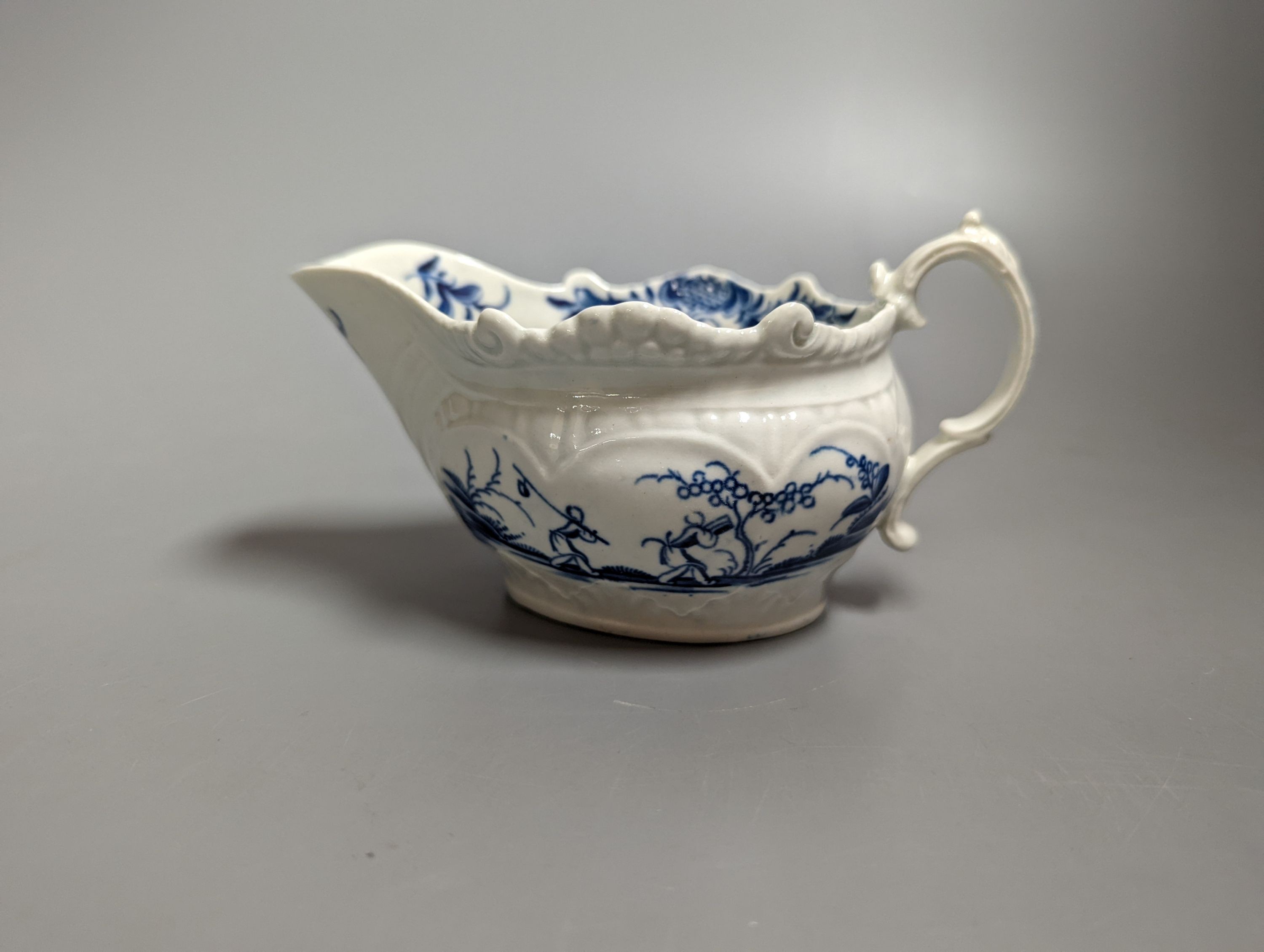 A small Worcester creamboat well painted with the Two Porter Landscape, c.1765, 6cms high